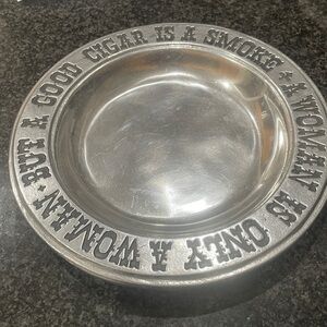 Vintage 1970Wilton Armetale
A WOMAN IS ONLY A WOMAN BUT A GOOD CIGAR IS A SMOKE”